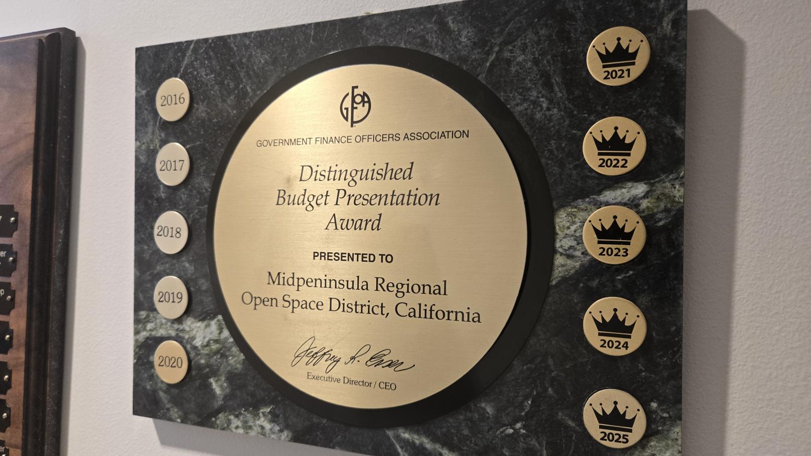 Wall plaque noting Midpens' Distinguished Budget Presentation Award