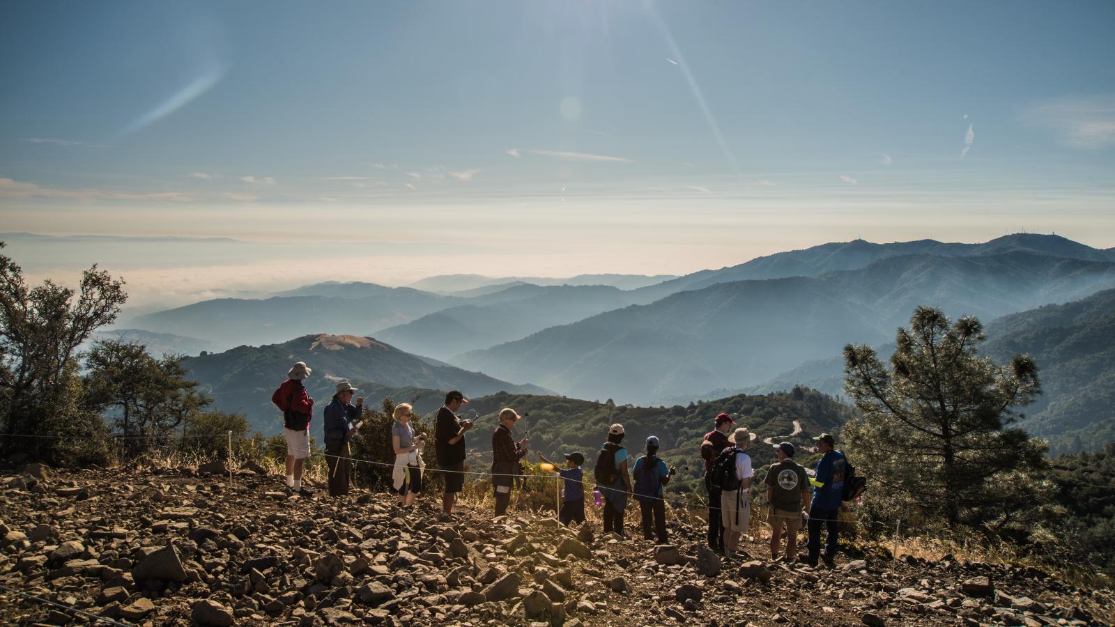 photo by Erin Ashford Group exploring Mount Umunhum summit / photo by Erin Ashford