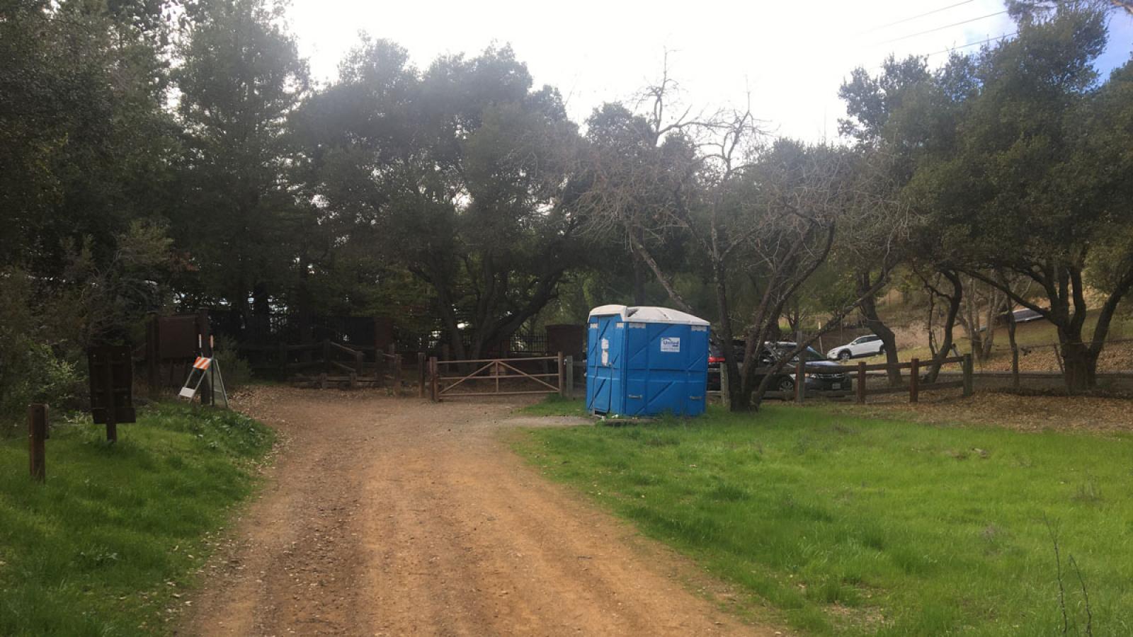 portable restroom at a trailhead