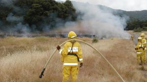 Midpen staff watching over a prescribed burn