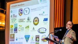 A speaker from the Santa Cruz Mountain Stewardship Network at the first Science and Stewardship Symposium