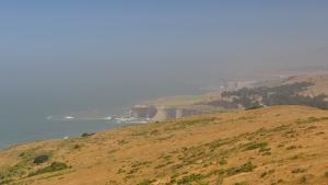 Grassy ocean cliffs overlook the Pacific Ocean in Tunitas Creek Open Space Preserve.