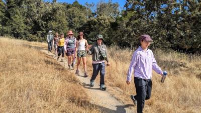 Group of people hiking as part of Branching Out Adventures event