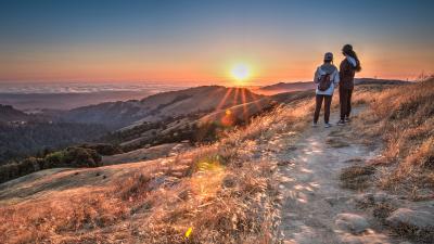 Photo: Larry Chow two women watching the sunset