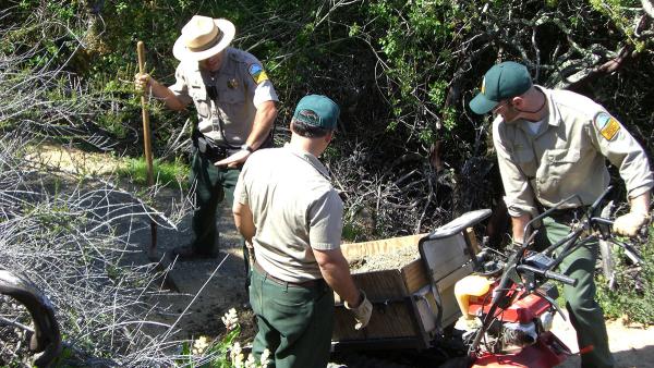 field staff at work on a trail