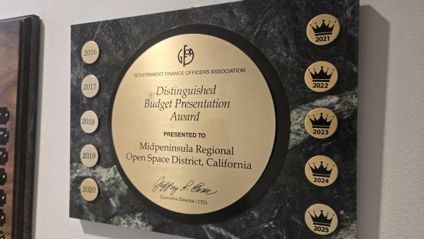 Wall plaque noting Midpens' Distinguished Budget Presentation Award