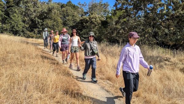 Group of people hiking as part of Branching Out Adventures event