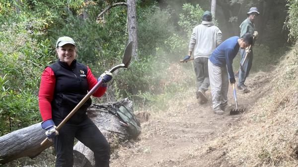 Volunteers work on a trail maintenance project