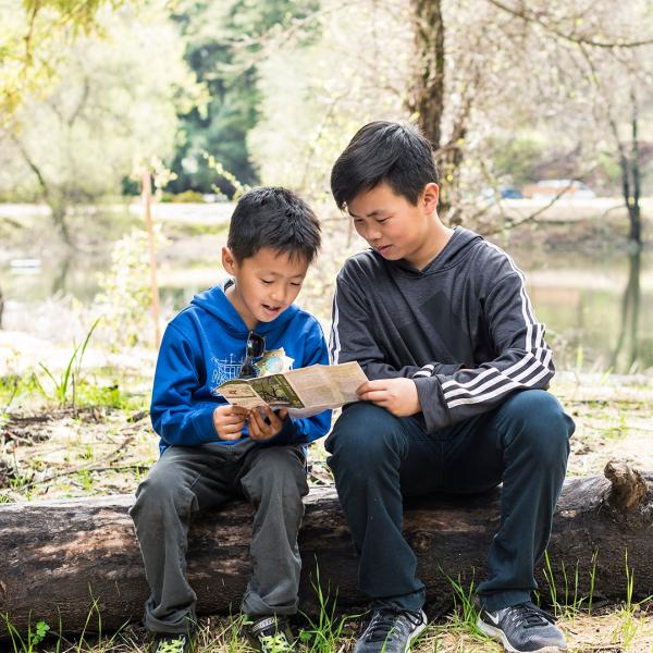 kids looking at a map