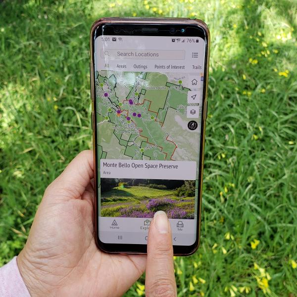 Download the OuterSpatial app on your phone hands using OuterSpatial app on mobile phone