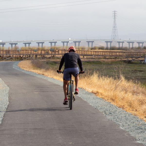 Photo: Mike Kahn person riding a bike on a trail